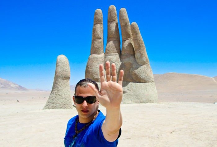 Marcello-Arrambide-at-the-hand-in-the-sand-Chile-728x494