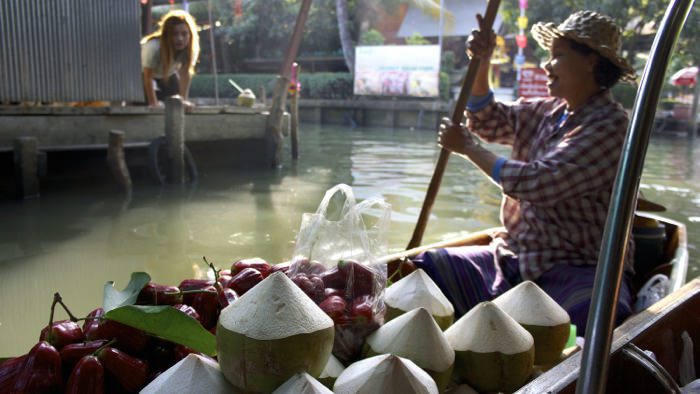 coconuts-damnoen-floating-market-thailand-davidsbeenhere