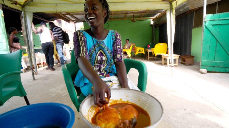African woman preparing food