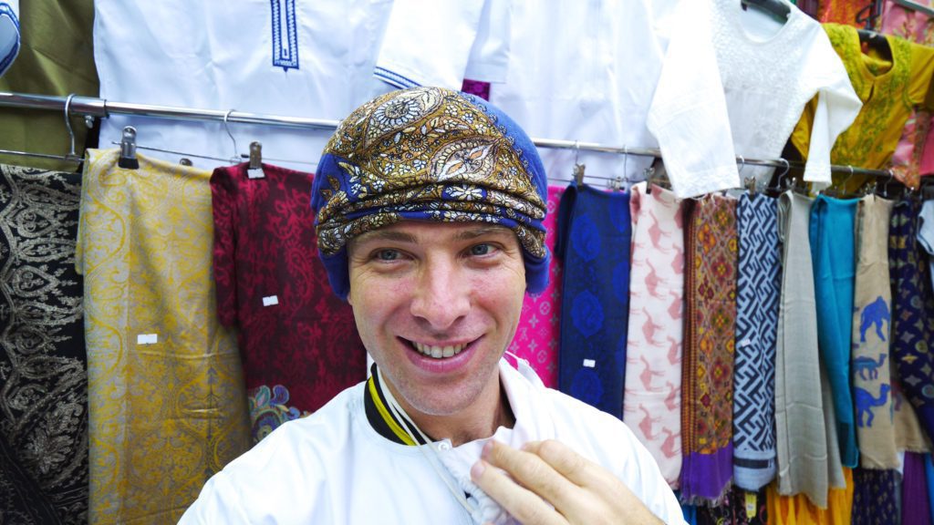 Wearing a massar in Mutrah Souq in Muscat, Oman