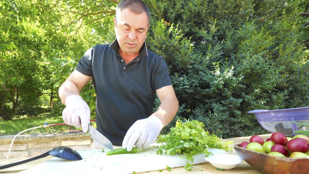 A local man prepares a meal at his home near Tbilisi, Georgia