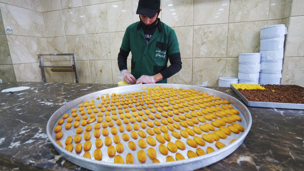 A baker preparing Lebanese sweets at Al Bohsali Sweets in Tyre, Lebanon