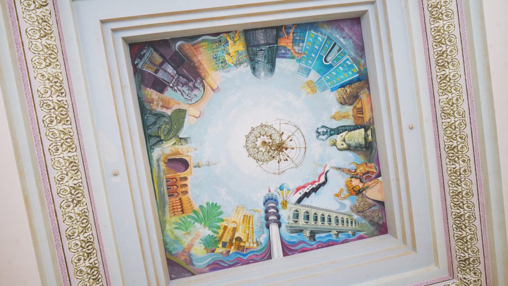 A colorful painting on the ceiling inside Saddam Hussein's palace | Davidsbeenhere