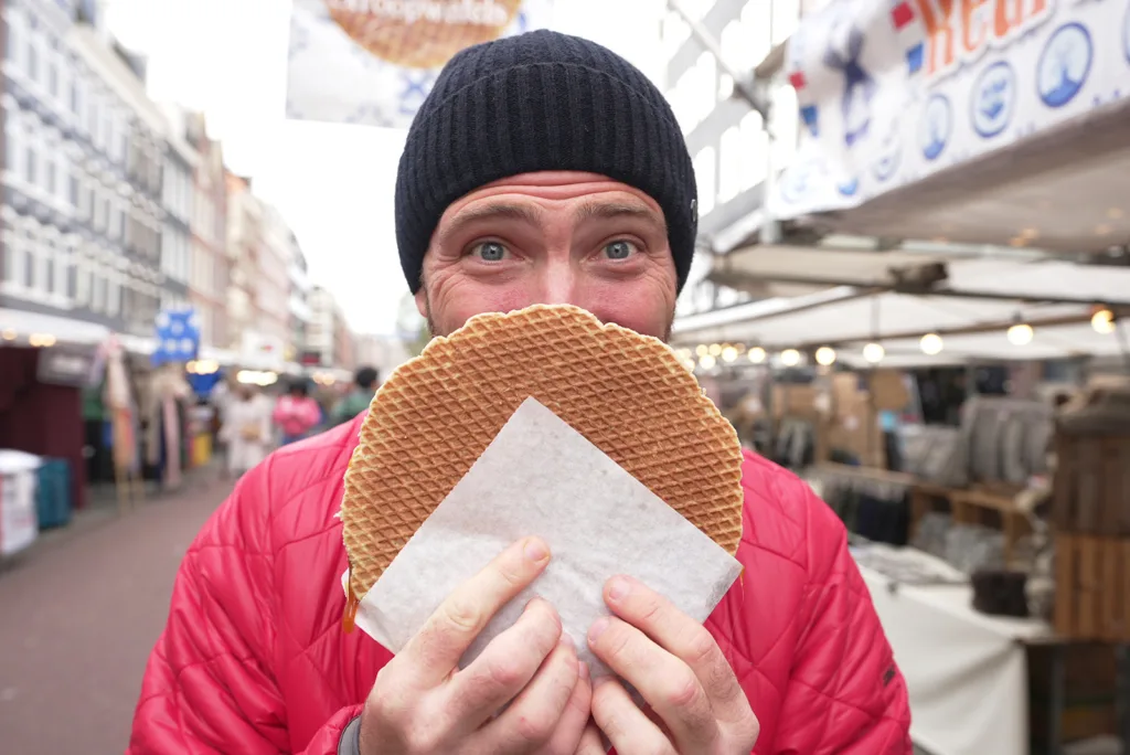 Trying a stroopwafel on the street in the Netherlands | Davidsbeenhere