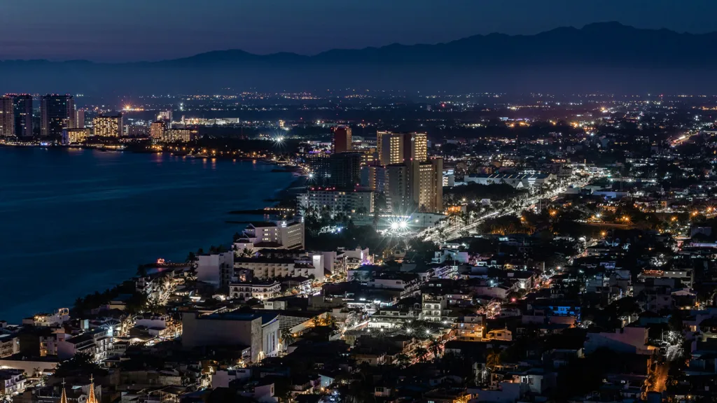 An aerial view of the city of Puerto Vallarta at night | Davidsbeenhere