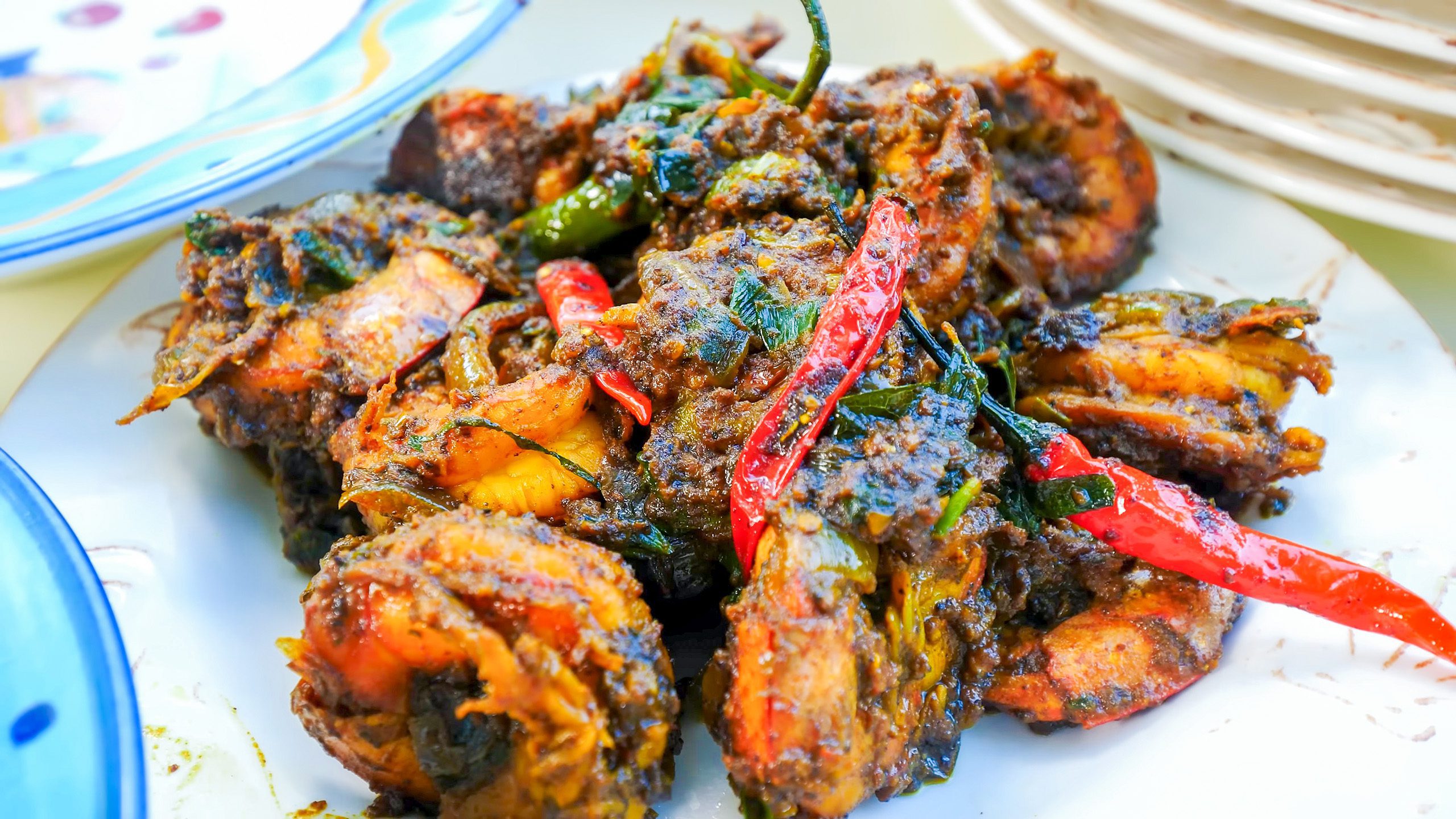 A closeup of shrimp curry, a popular Guyanese food | Davidsbeenhere