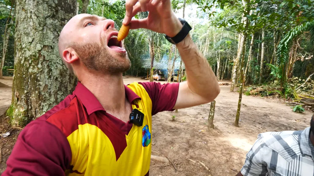 David Hoffmann tries exotic food, a live Tacoma worm, in the jungles of Guyana | Davidsbeenhere