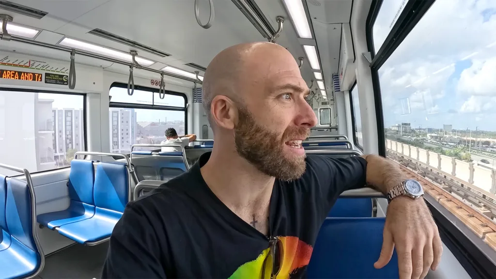 David Hoffmann rides the Metrorail train in Miami, Florida | Davidsbeenhere