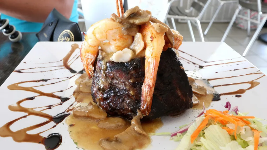 The volcano surf and turf, a cone-shaped mound of beef topped with shrimp, in coastal Puerto Rico | Davidsbeenhere
