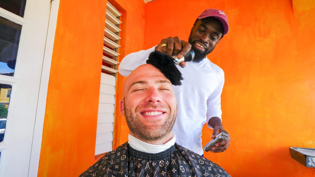David Hoffmann getting a quick Barbados haircut from a local barber | Davidsbeenhere