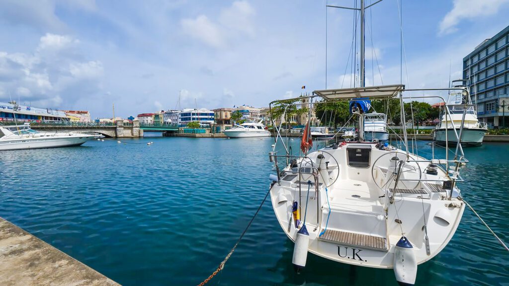 A boat moored in the harbor of Bridgetown, Barbados | Davidsbeenhere